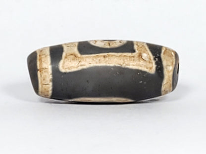 At-022624-HEG, Face D bold cream T-bar bracket connector linking oval and framed eye faces, charcoal-grey agate, unretouched