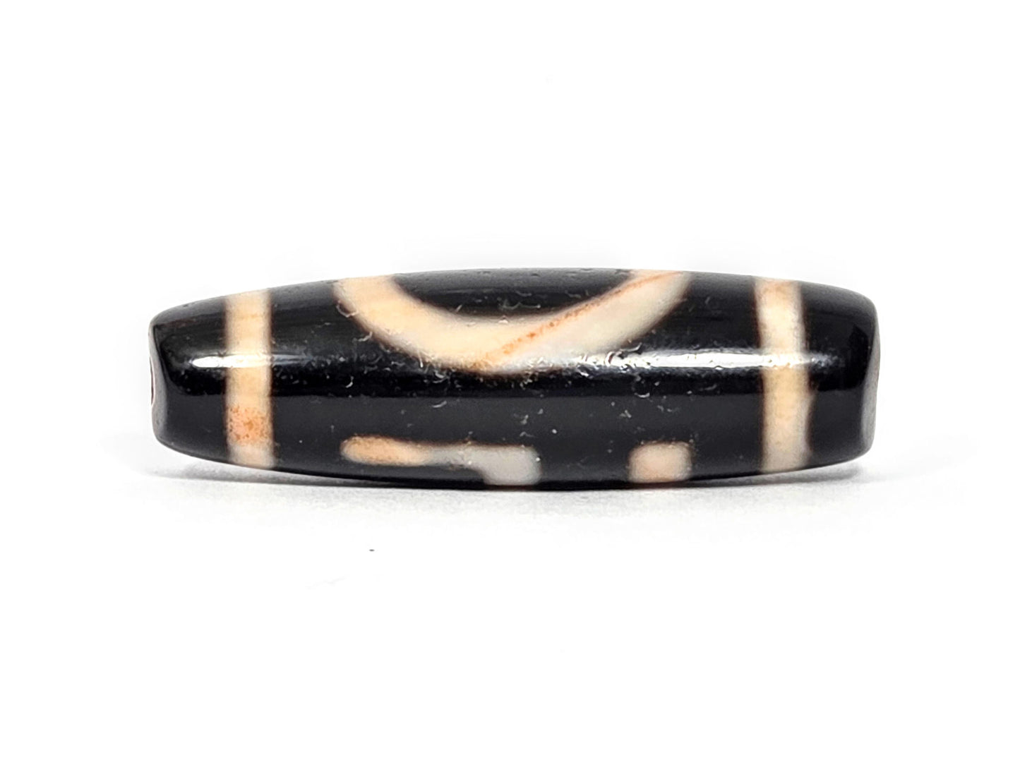 At-072326-1ESWBS antique one eye yungdrung dzi pitch-black agate transitional face eye arc swastika emerging unretouched