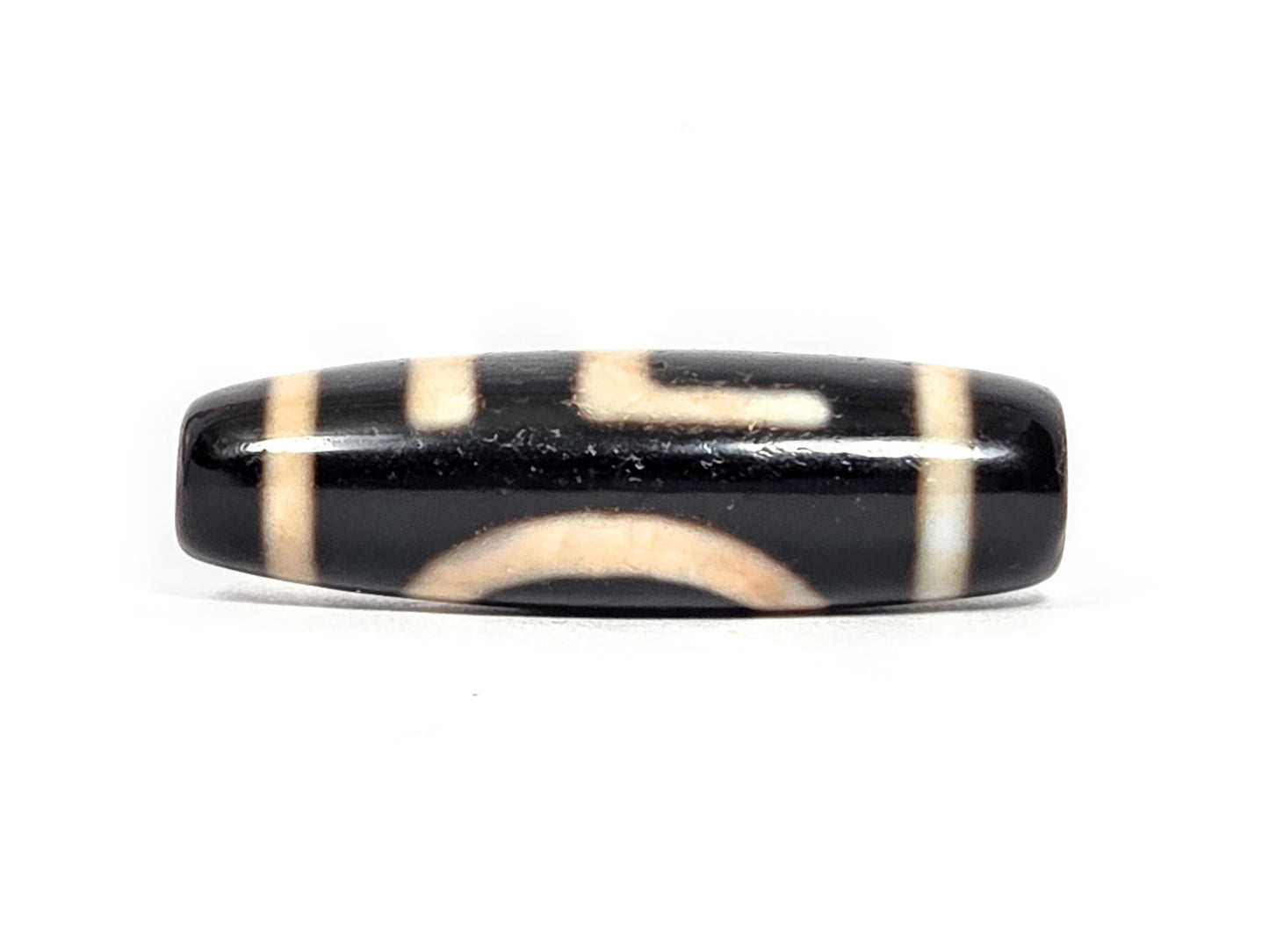 At-072326-1ESWBS antique one eye yungdrung dzi pitch-black agate transitional face swastika upper arc below unretouched