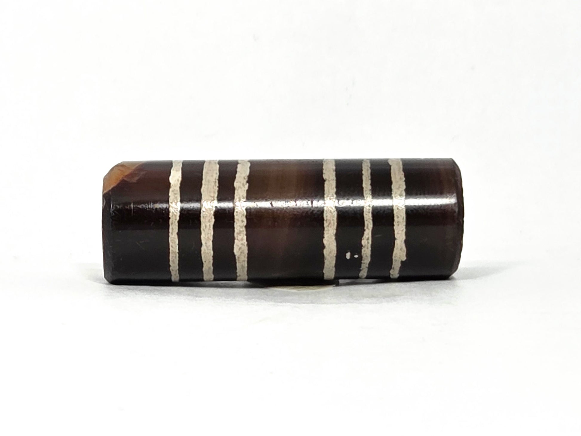 Ac-062226-6Str, six stripe agate dzi, warm dark brown barrel, six sandy-cream bands, opposite side view, unretouched