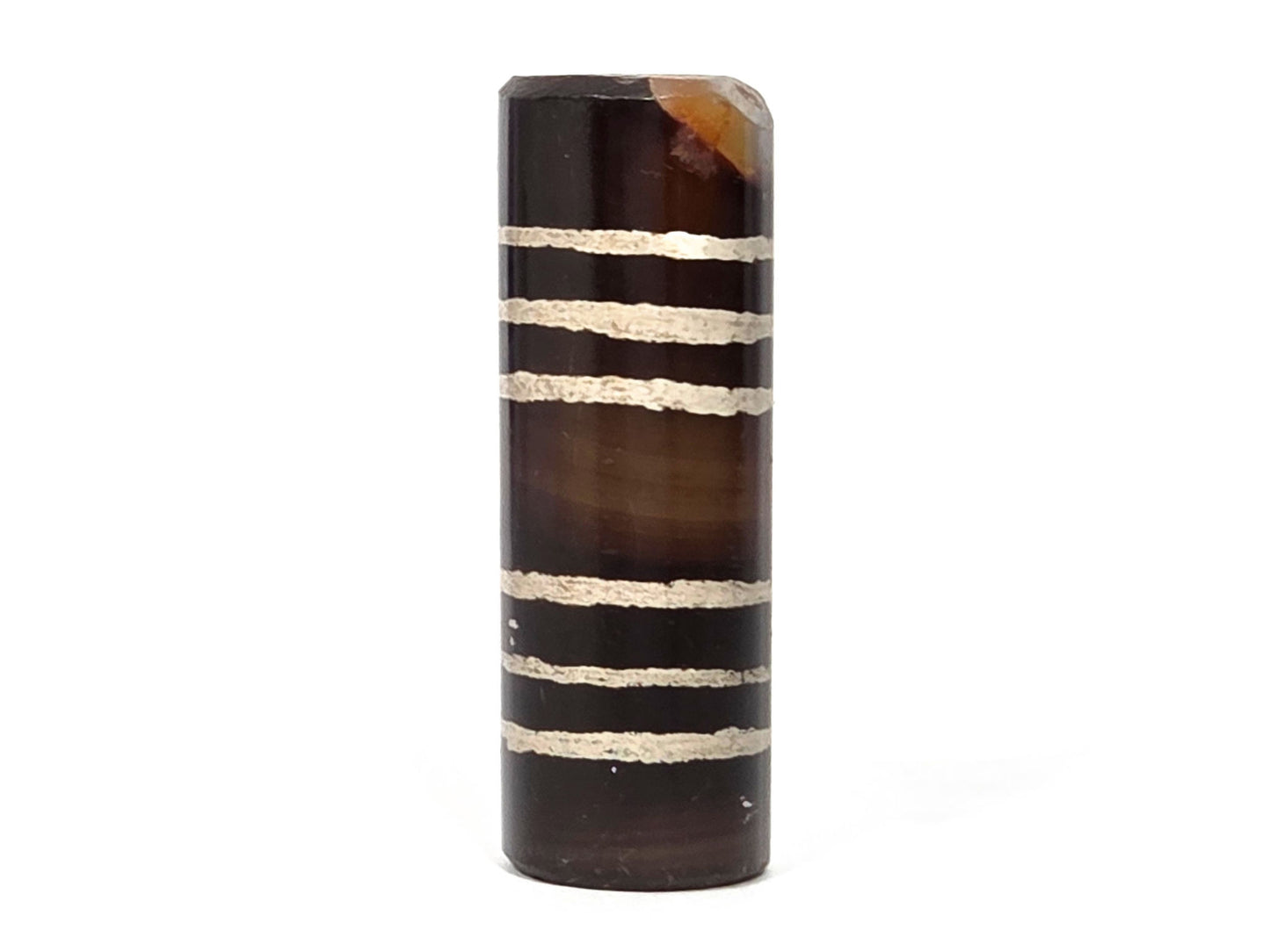 Ac-062226-6Str, front-face view showing all six sandy-cream stripes, warm dark brown ground, chip at top, unretouched