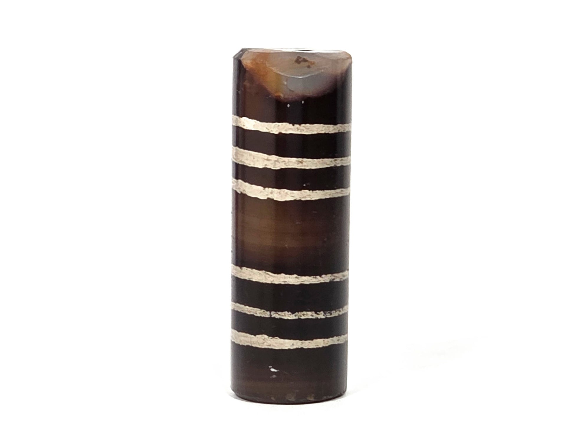 Ac-062226-6Str, reverse face view, six stripe agate dzi, warm dark brown, chip at top rim visible, unretouched