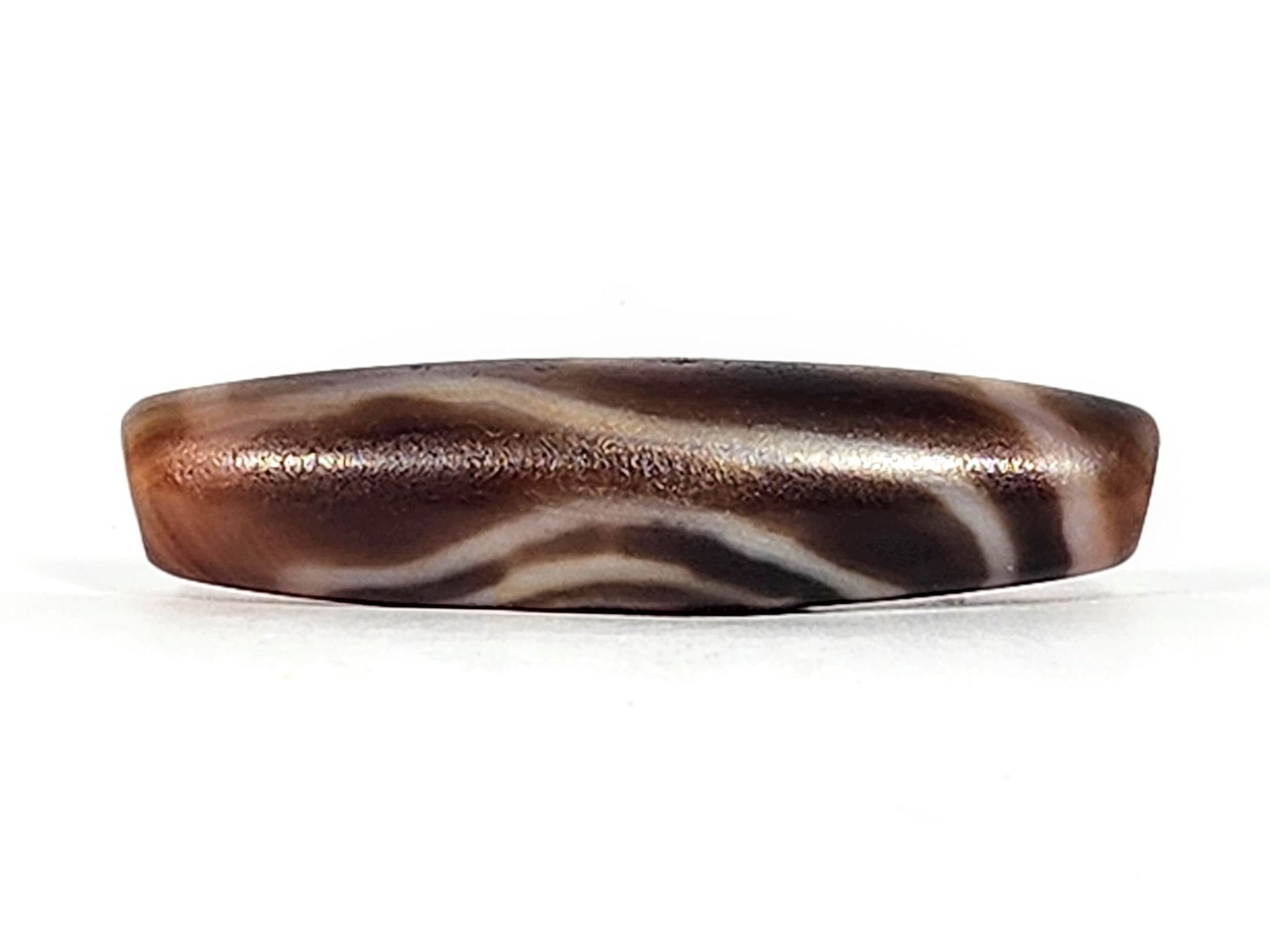 Antique eye-in-eye heaven gate dzi — reverse face, flowing wave tiger tooth pattern, copper-bronze ridge sheen, At-0426-EIE