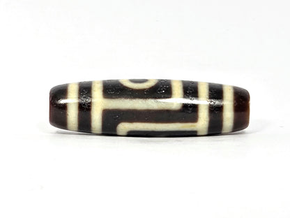 N-090525-2E second stepped-line face, angular maze pattern, pitch-black cream agate, unretouched