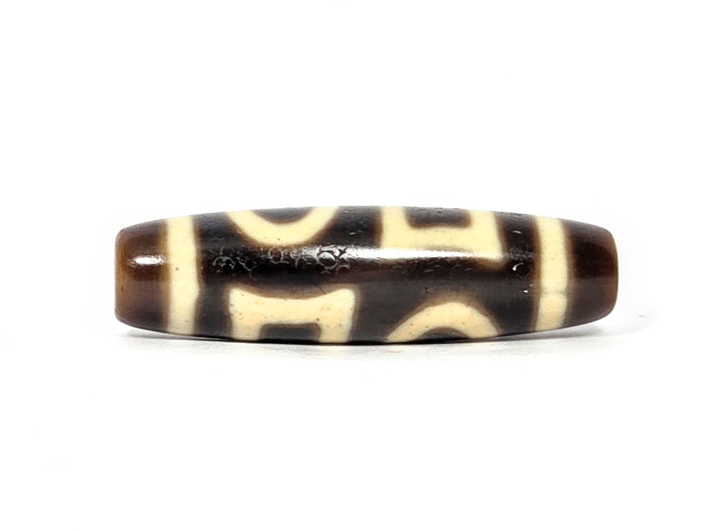 N-062926-DHE face B, arch elements visible, very dark brown cream-white double heaven earth agate dzi, unretouched