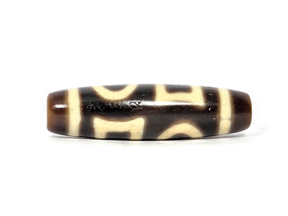 N-062926-DHE face B, arch elements visible, very dark brown cream-white double heaven earth agate dzi, unretouched
