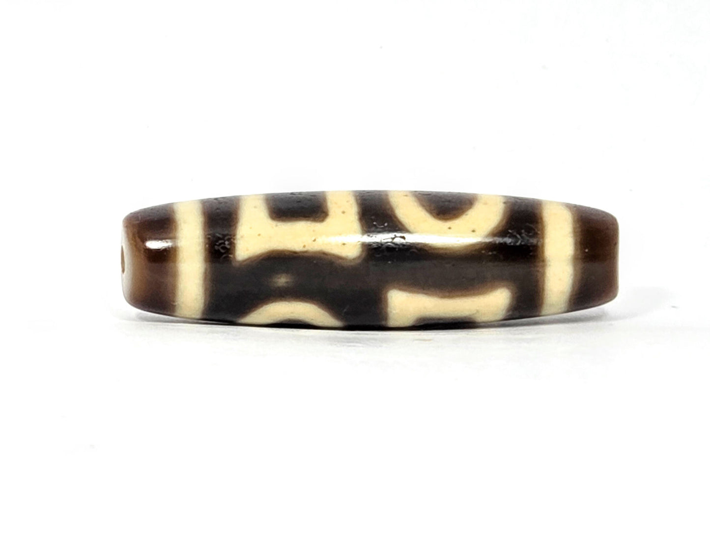 N-062926-DHE face D, curved arch form dominant, double heaven earth motif, very dark brown agate, unretouched