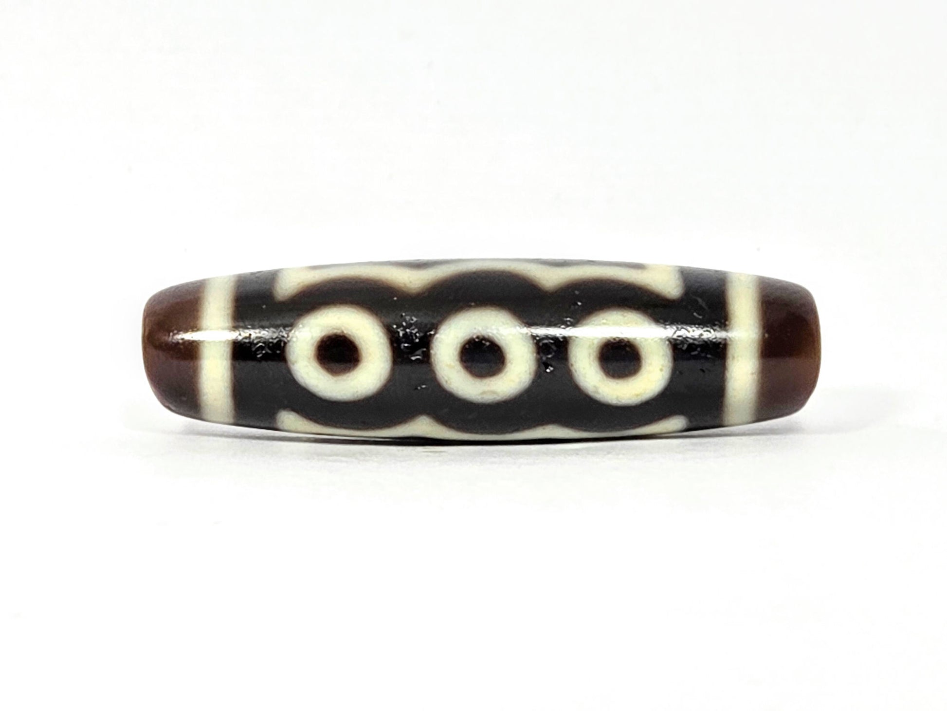 N-091125-5E2 three-eye face, very dark brown agate, cream-white eye rings and dividers, 41.2×11.4mm, unretouched