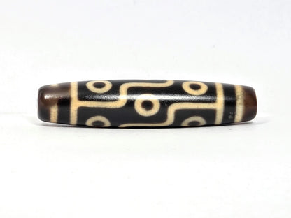 N-122225-9E Nine Eye dzi bead, rotated view showing full nine eye sequence, unretouched