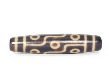 N-041424-9E Nine Eye dzi bead, alternate front angle, dark brown ground, cream motif, unretouched