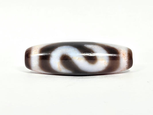 N-070526-MHkBS hero flat, money hook dzi, 36.8×11.6mm, very dark brown agate, cream-white motif, unretouched