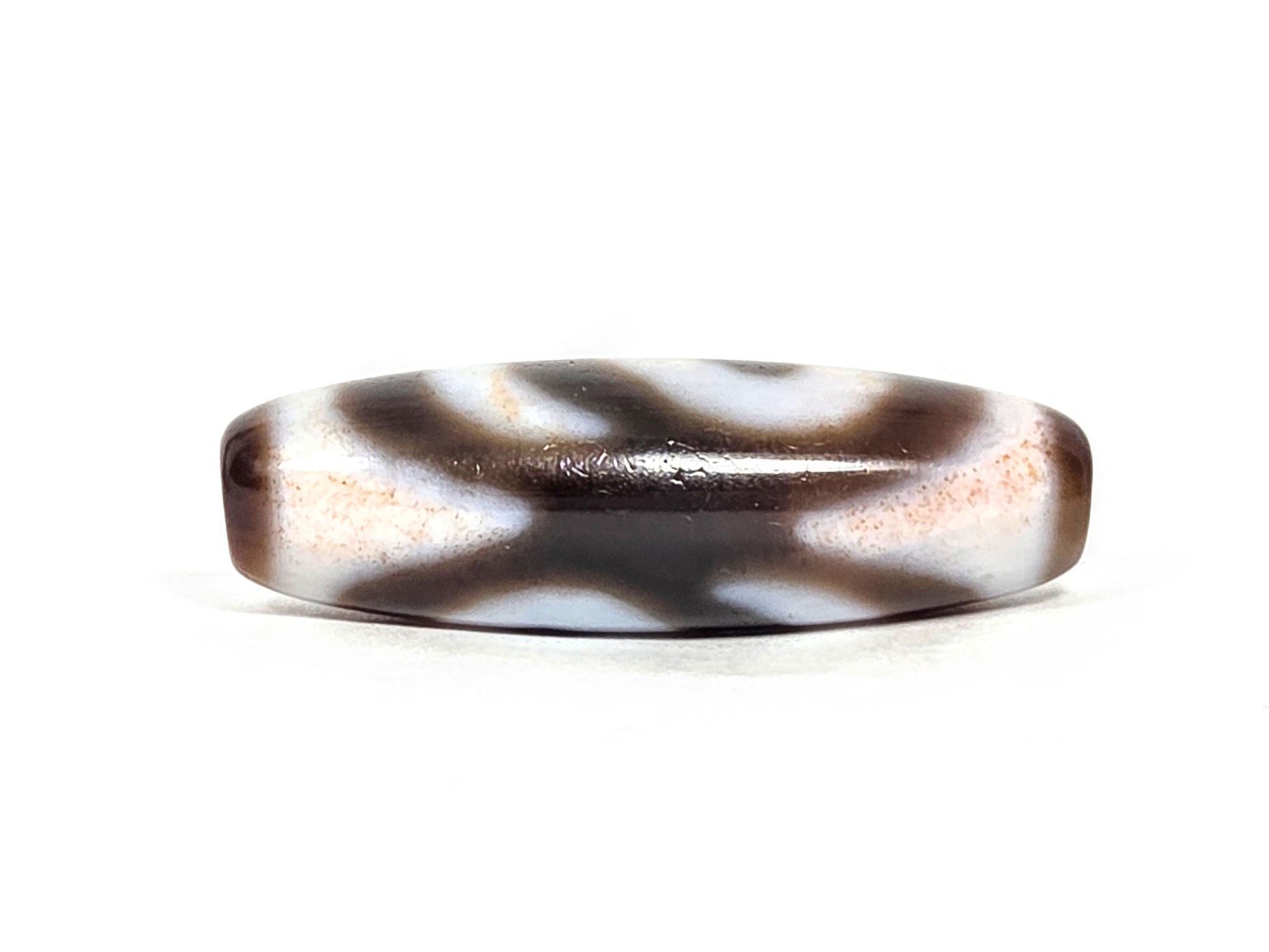 N-070526-MHkBS rotated face 2, money hook dzi, very dark brown ground, open wing-form motif reading, unretouched
