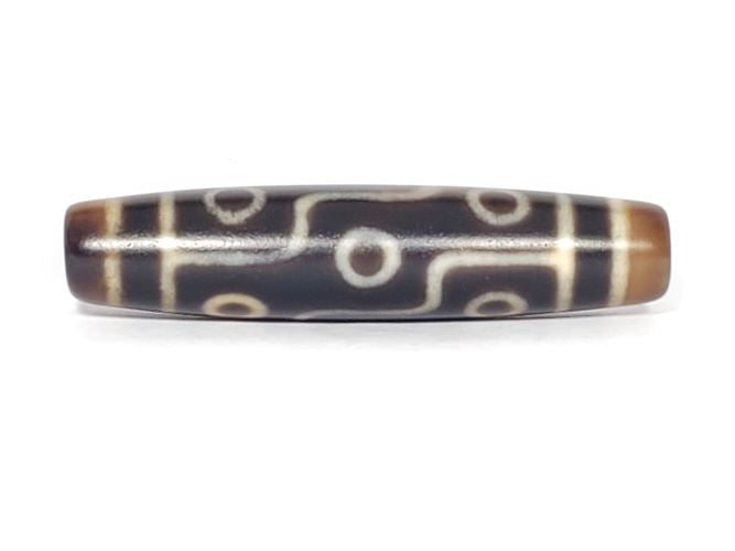N-102123-9E Nine Eye dzi bead, front view, two-tone brown agate, 58.2×13.2mm, unretouched