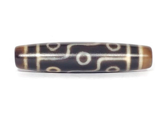 N-102123-9E Nine Eye dzi bead, front view, two-tone brown agate, 58.2×13.2mm, unretouched