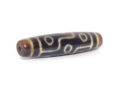 N-102123-9E Nine Eye dzi bead, opposite angled end view, drill channel visible, unretouched