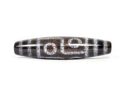 N-062126-6E dzi bead, close side profile, eye and bar dividers, unretouched