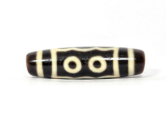 N-091025-5E two-eye face, very dark brown agate, cream-white eye rings and dividers, 40.5×11.4mm, unretouched