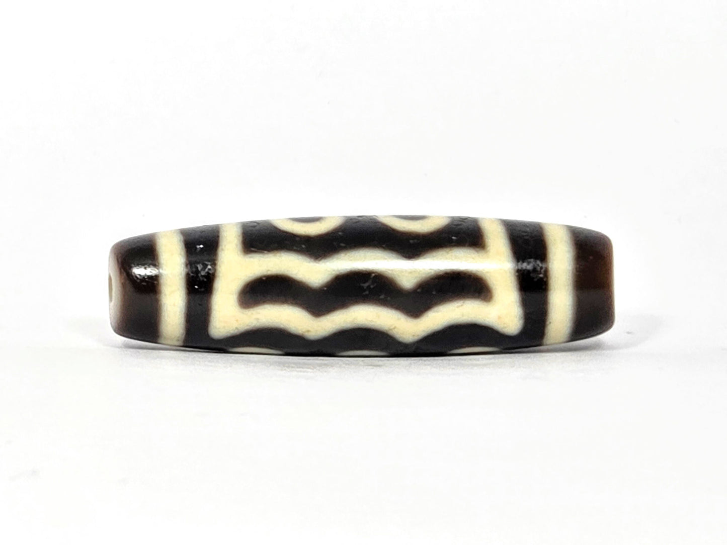 N-091025-5E wave-band rotation, zigzag motif transition zone, very dark brown agate, unretouched