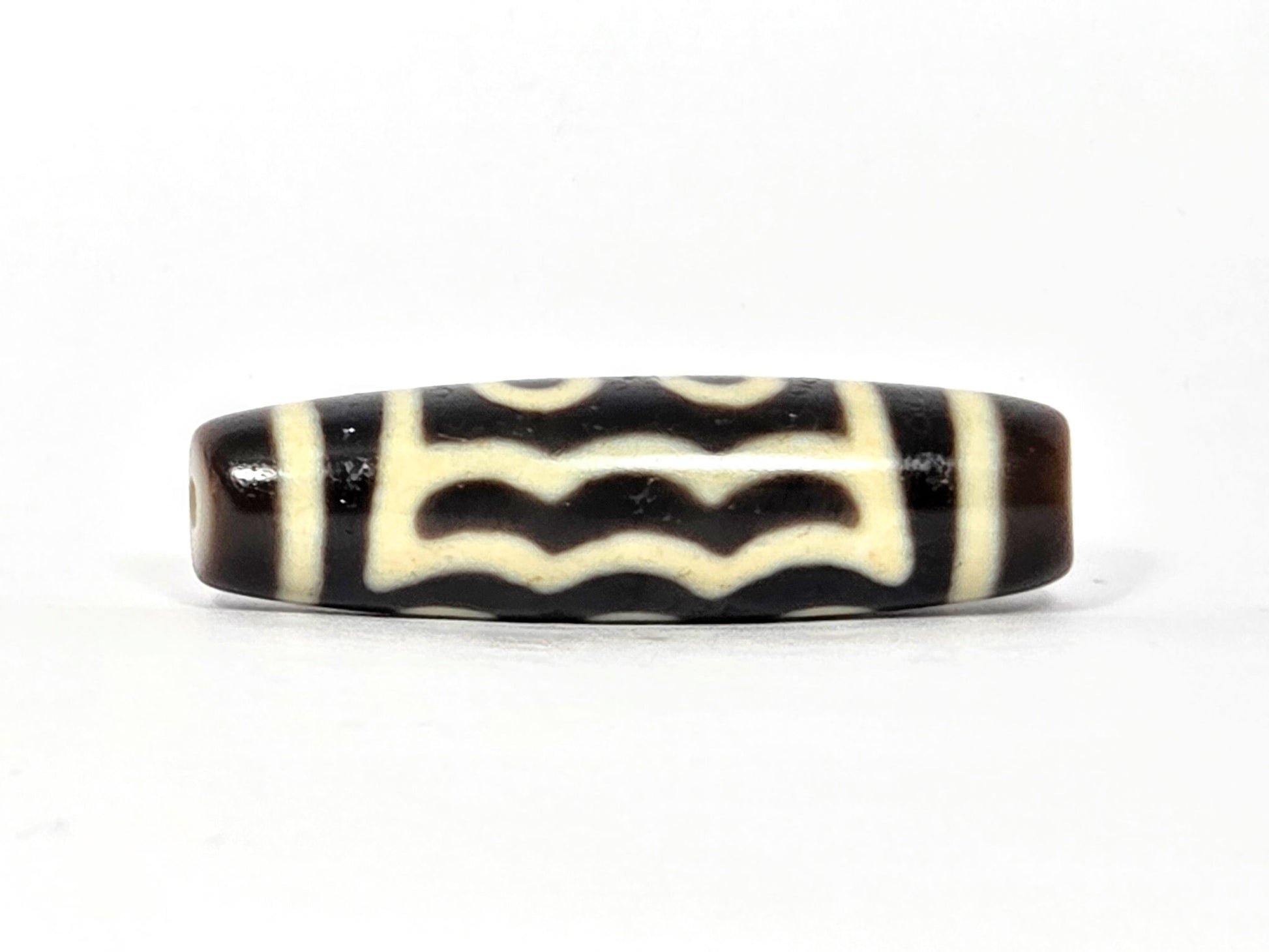 N-091025-5E wave-band rotation, zigzag motif transition zone, very dark brown agate, unretouched