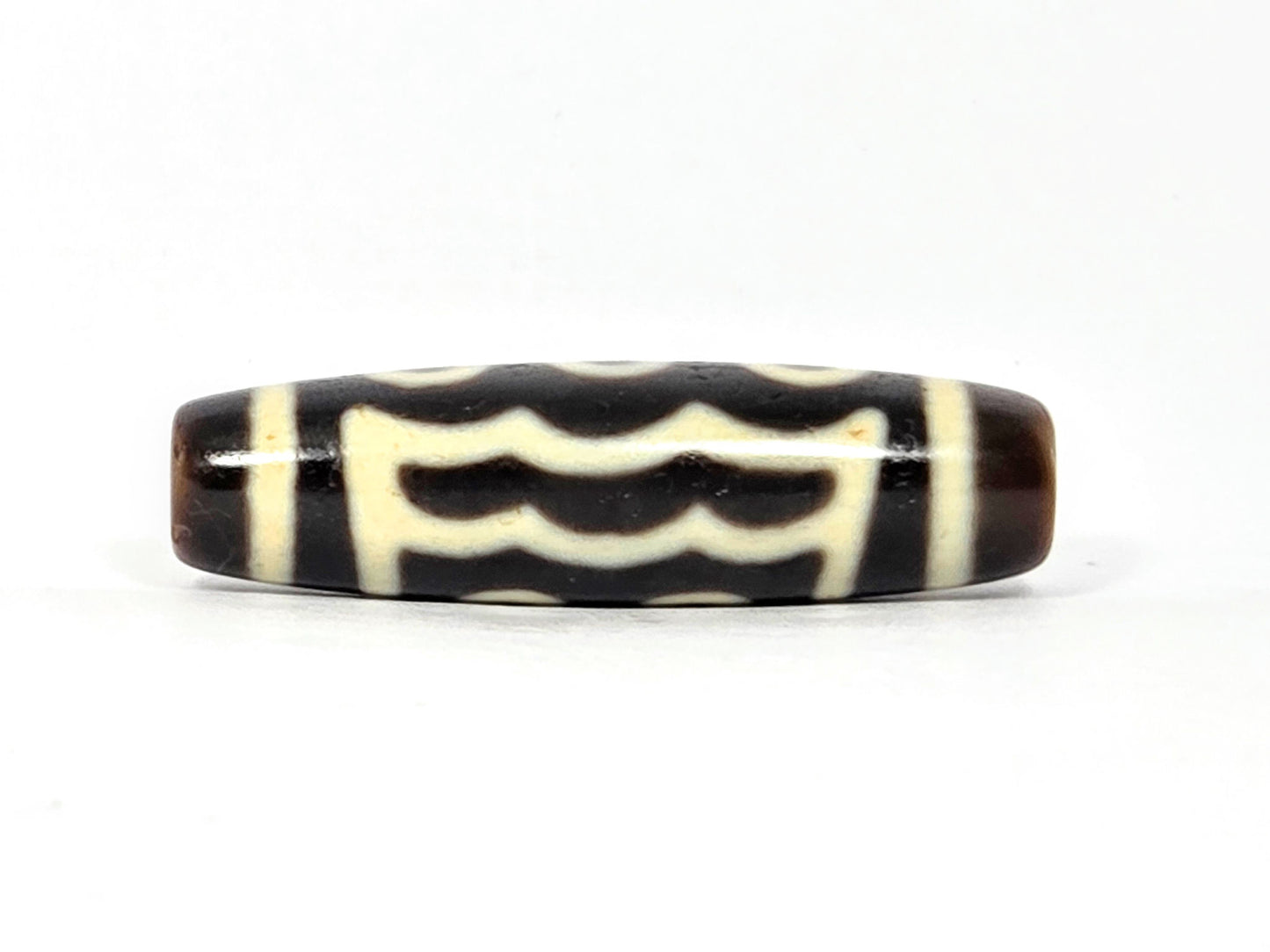 N-091025-5E second wave-band rotation, continuous zigzag pattern, very dark brown cream agate, unretouched