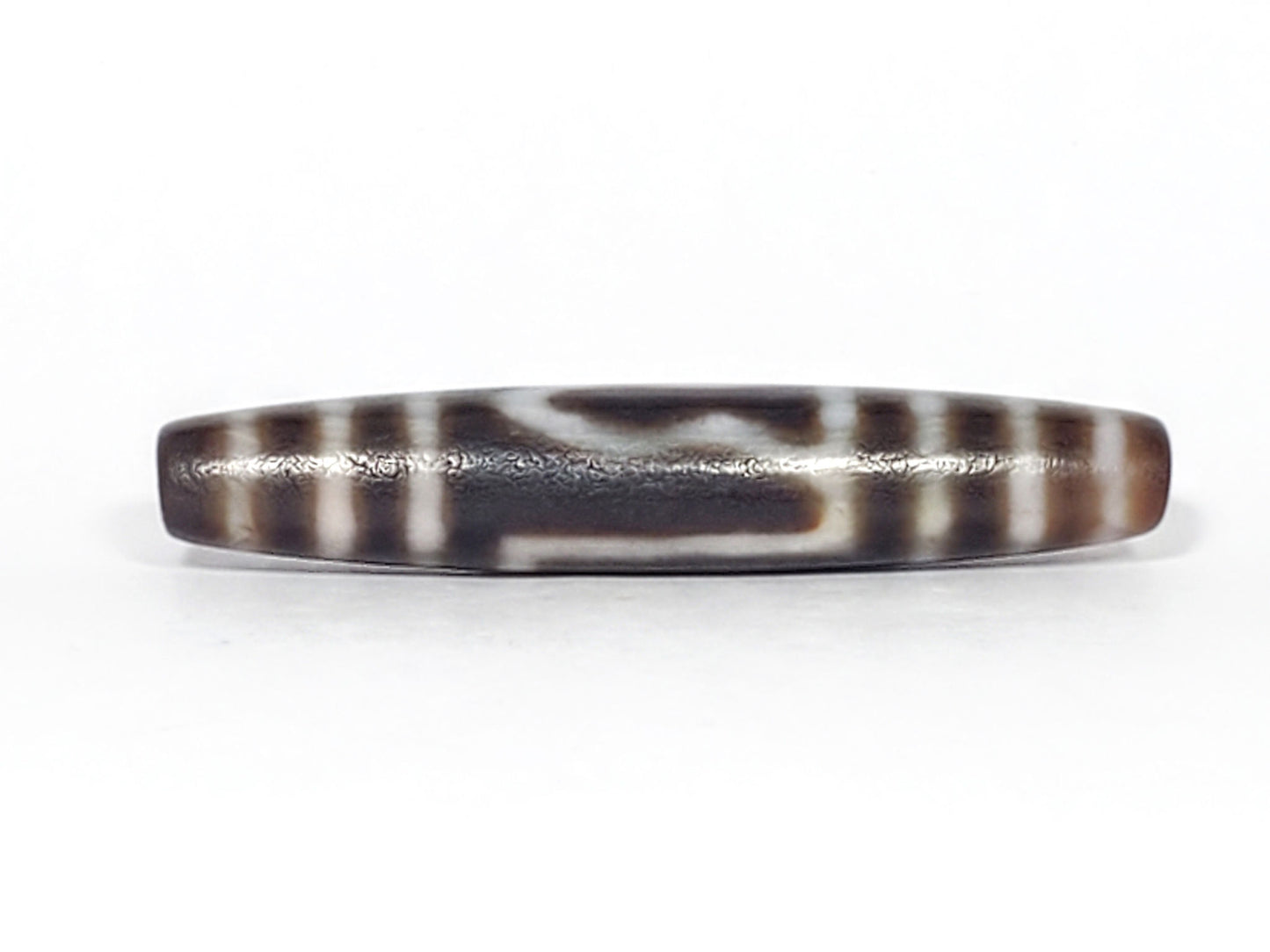 Ancient one eye mountain dzi — opposite side, dark brown ground, deep patina and age wear visible, Anc-0426-1EMt