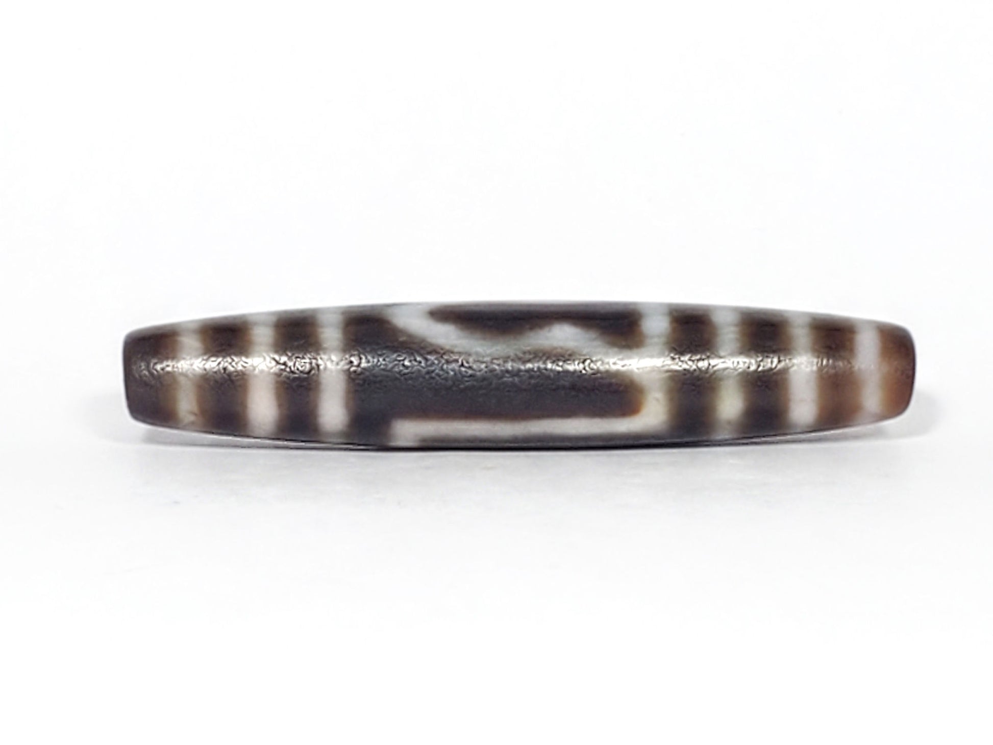 Ancient one eye mountain dzi — opposite side, dark brown ground, deep patina and age wear visible, Anc-0426-1EMt
