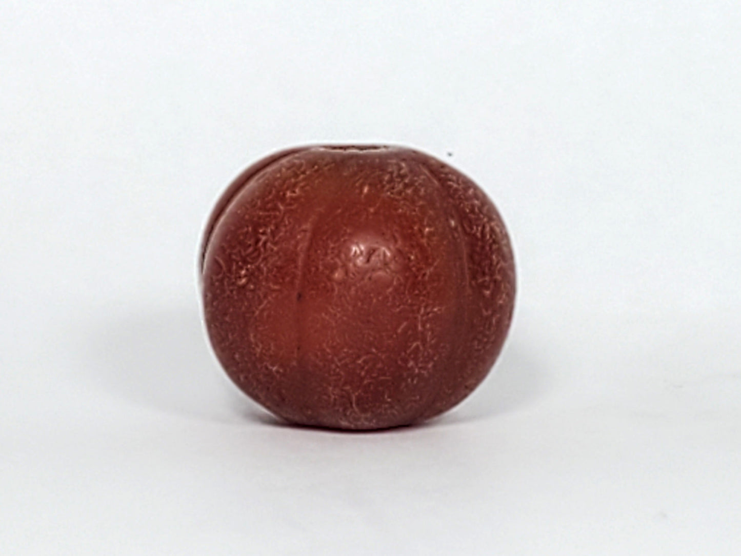 Ac-061126-PKP Bead A second face, dense surface crazing, smooth rib peaks contrasting crazed valleys, unretouched