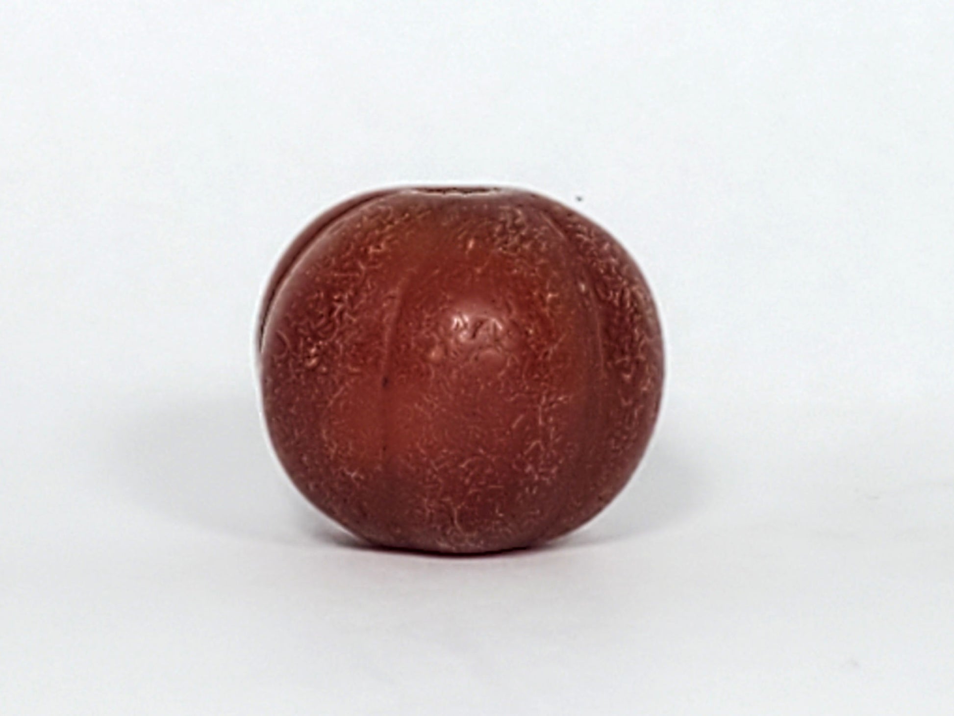 Ac-061126-PKP Bead A second face, dense surface crazing, smooth rib peaks contrasting crazed valleys, unretouched