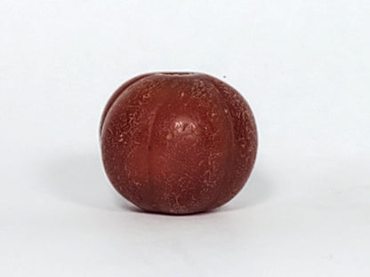 Ac-061126-PKP Bead A second face, dense surface crazing, smooth rib peaks contrasting crazed valleys, unretouched
