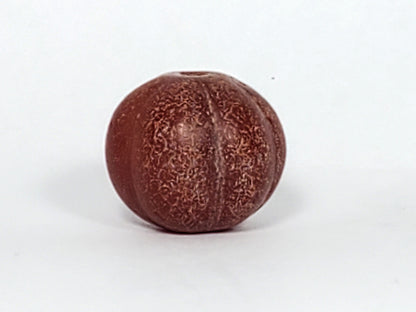 Ac-061126-PKP Bead A third face, most dense crackle pattern visible, reddish-brown lobed carnelian, unretouched