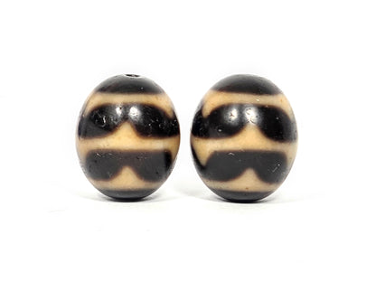 Pair of round Double Wave Dzi beads showing wave pattern etching on natural agate — Taiwan 1980s vintage