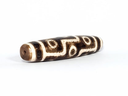 Qing Dynasty nine eye dzi — opposite angled end, drill hole at warm brown tip, nine eye motif on body, At-0426-9EQ