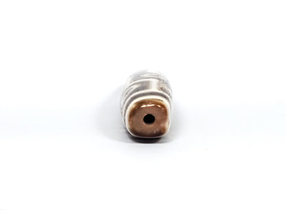 Qing Dynasty nine eye dzi — end-on, squared rectangular cross-section with rounded corners, centred drill hole, At-0426-9EQ