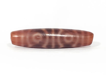 At-082624-6EBS, Face C with two closed eyes, warm beige-cream rings, matte aged surface texture, unretouched