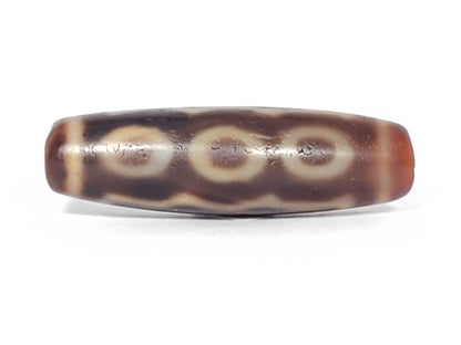 At-061926-3EEG second eye face, linked double-ring motif, cream-white frame, unretouched