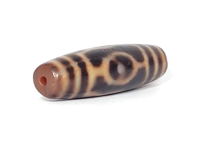 At-061926-3EEG angled tip B, linked ring motif visible, terracotta end cap, unretouched