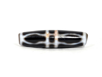 V-070526-3VjBS rotated face 4, triple vajra dzi, dark brown black ground, white motif, unretouched