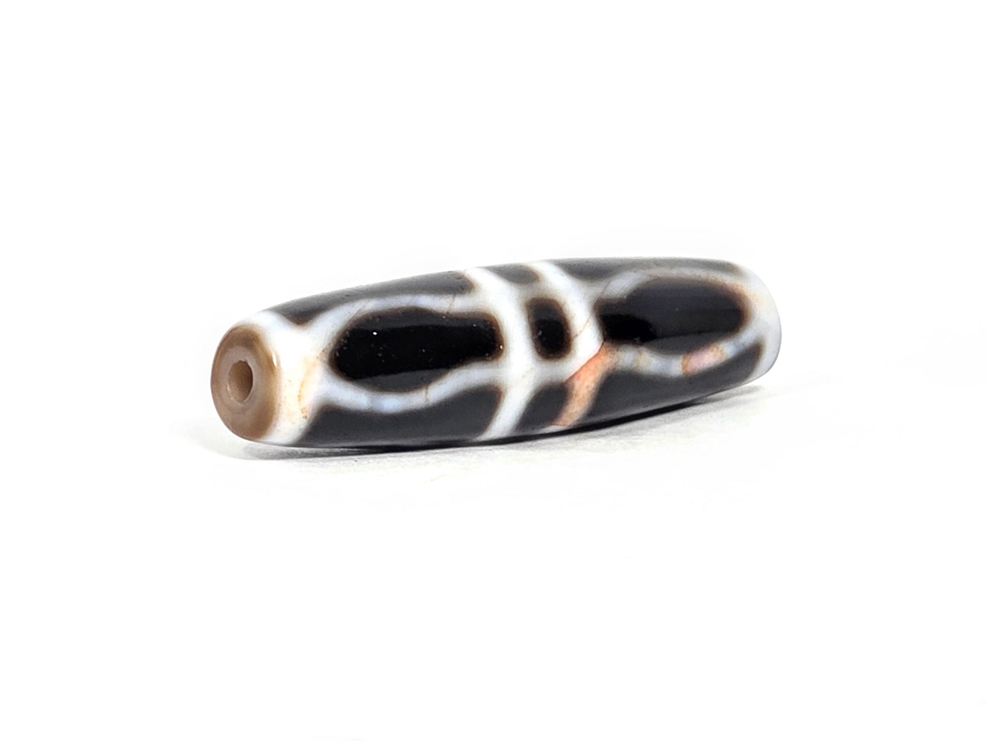 V-070526-3VjBS opposite drill-end angled, triple vajra dzi, grey-beige end cap, dark brown black agate, unretouched