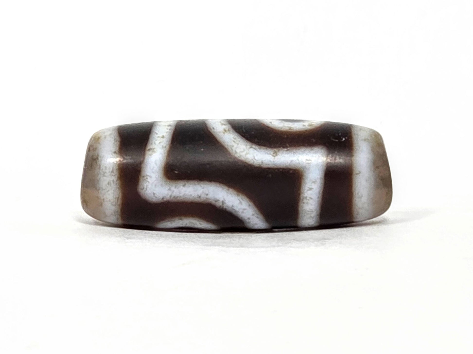 V-062126-2E dzi bead, opposite side profile, second eye face, unretouched