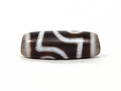 V-062126-2E dzi bead, opposite side profile, second eye face, unretouched