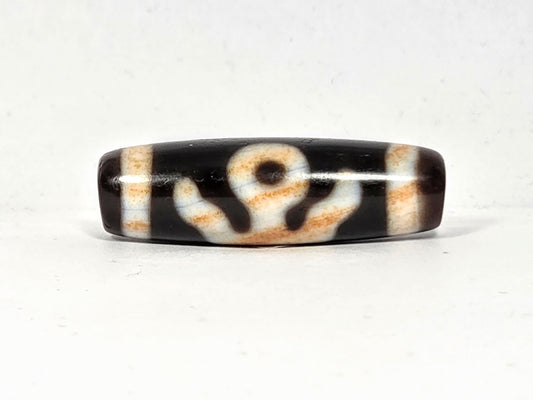 Vintage Benefactor motif dzi bead V-021326-BenBS, 36.8×11.6mm, front face, pitch-black & dark brown agate, unretouched.