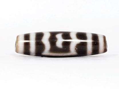 V-091424-GarudaBS Garuda dzi bead, front face, two-tone agate, 40.7×11.4mm, honey-tan ends, dark body, unretouched