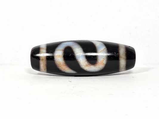 Vintage Money Hook Motif Dzi Bead with black agate, white and tan striped patterns, polished surface