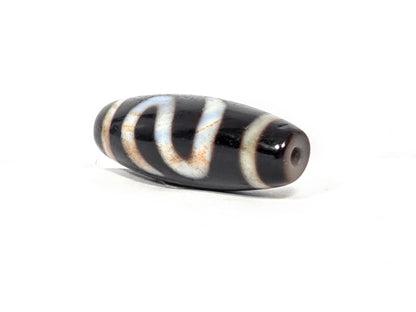 Vintage money hook motif dzi bead with striped agate pattern, black and white bands, natural patina, drilled hole