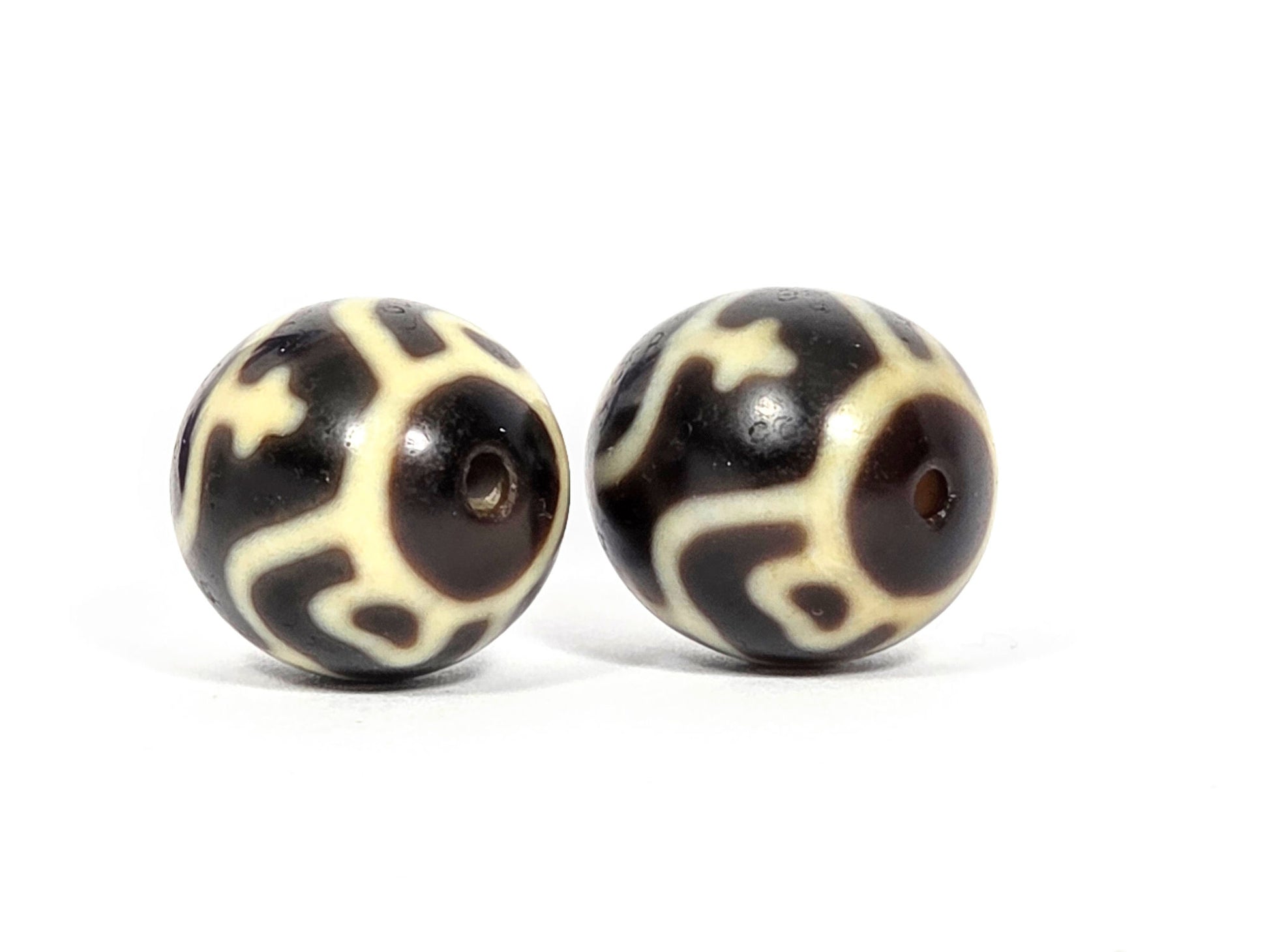 V-073026-TVP2 vintage round treasure vase dzi pair drill-end view dark brown agate scrollwork unretouched