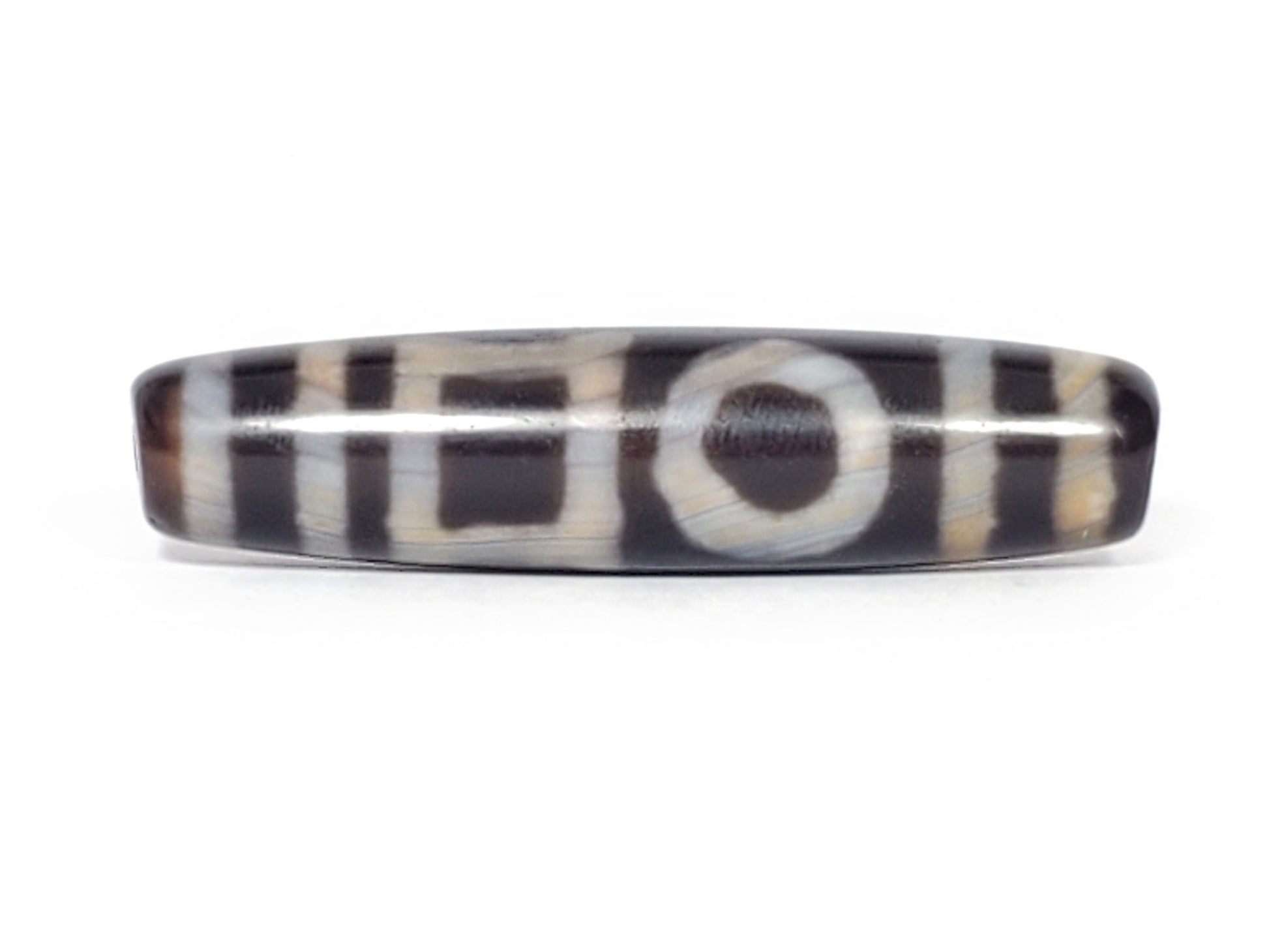 V-092723-DHE Double Heaven & Earth dzi bead, third face angle, fine surface marks at equatorial area visible, unretouched