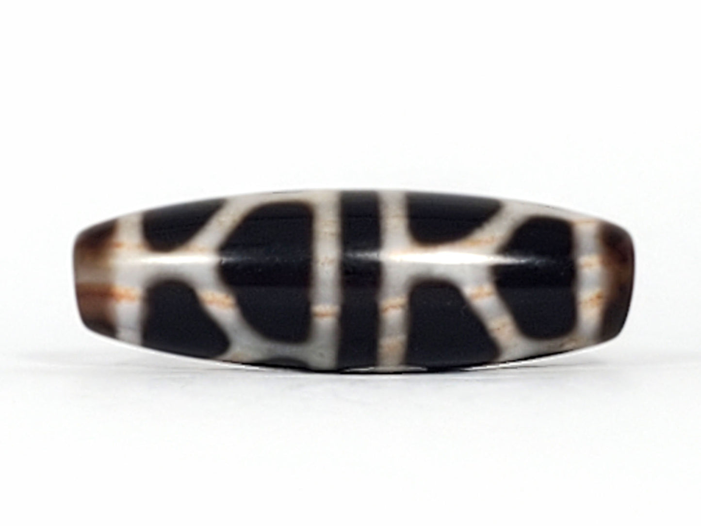 V-092824-DLBS2 Double Longevity dzi bead, third face angle, minor surface mark visible in lower cream zone, unretouched