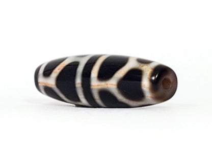 V-092824-DLBS2 Double Longevity dzi bead, fourth face angle, pitch-black ground with wide cream tortoise shell lines, unretouched