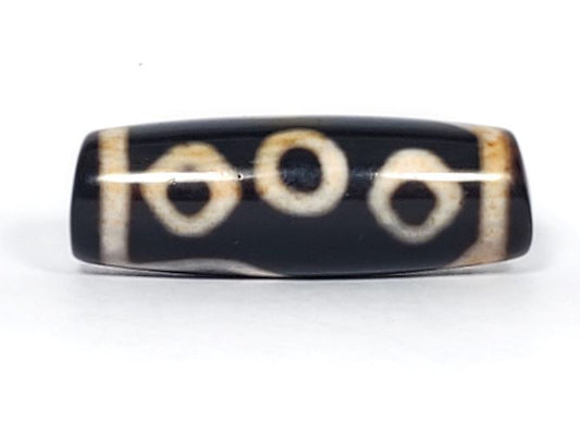 V-102723-6EBS Six Eye dzi bead, front face, pitch-black agate, 37.8×13.7mm, three eyes visible, unretouched
