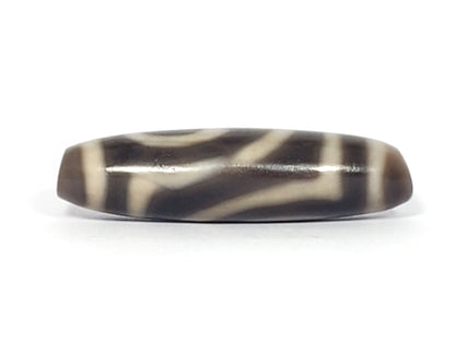 Ac-071026-TWE3 ancient two eye dzi charcoal grey-brown agate face D flat cross-section softer contrast unretouched